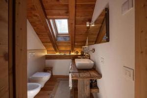 Ванная комната в Casa TRI - Wellness Chalet +27 фотографий