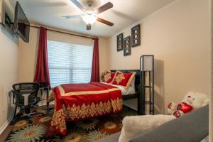 a bedroom with a bed and a ceiling fan at Blessed Home in Leander in Leander
