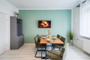 Μια τηλεόραση ή/και κέντρο ψυχαγωγίας στο Cozy Home Böhlen