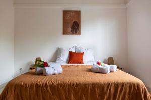 Ένα ή περισσότερα κρεβάτια σε δωμάτιο στο La Villa Mahogany, Capesterre Belle-Eau +32 φωτογραφίες