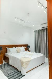 Katil atau katil-katil dalam bilik di Joalis Villa Polhena Pvt Ltd