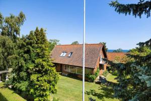 an image of a house with a roof at 6763-Allinge-Sdr-Strandvej-69 in Allinge