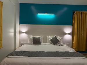 Imagine din galeria proprietății FabHotel SLR Residency în Bangalore