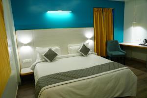 Imagine din galeria proprietății FabHotel SLR Residency în Bangalore