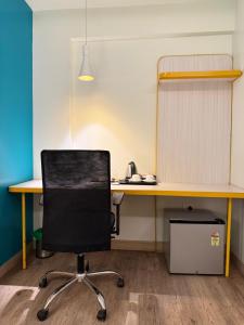 Imagine din galeria proprietății FabHotel SLR Residency în Bangalore +1 fotografie