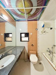 Koupelna v ubytování Le Tranquil Resort