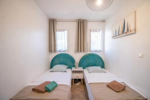 Postel nebo postele na pokoji v ubytování Maison Porto Vecchio 6p