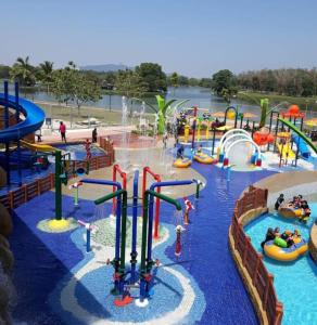 a water park with a bunch of water slides at Ustaz Zul Homestay, Taman Tunku Sarina, Jitra in Jitra