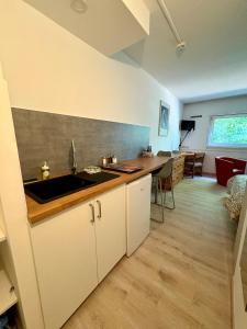 Køkken eller tekøkken på Le Phoenica - Former Hotel - Parking