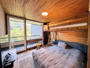 Postel nebo postele na pokoji v ubytování Résidence Olan - STUDIO 6 PERSONNES PIED DES PISTES MAE-9403