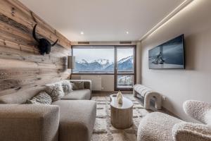 Et tv og/eller underholdning på Charmant duplex 2 chambres Courchevel 1550