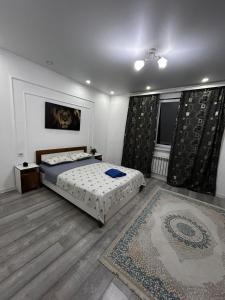 Katil atau katil-katil dalam bilik di Ush Sunkar apartment корпус 6