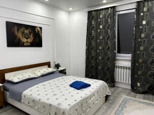 Katil atau katil-katil dalam bilik di Ush Sunkar apartment корпус 6