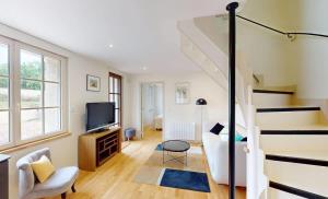 TV a/nebo společenská místnost v ubytování Au bord de l'Odon + 41 fotografií