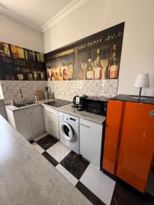 Η κουζίνα ή μικρή κουζίνα στο Yerevan Modern Holiday Apartment
