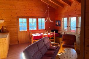 Ένα ή περισσότερα κρεβάτια σε δωμάτιο στο Chalet Val Roc - Dachwohnung West