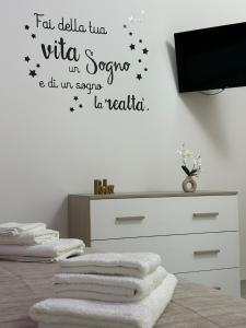 a bedroom with a bed with stars on the wall at IL SOGNO luxury house in Santa Tecla