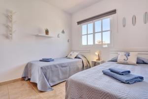 Ένα ή περισσότερα κρεβάτια σε δωμάτιο στο Gabrielle +29 φωτογραφίες