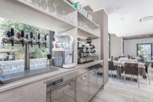 Kuchyň nebo kuchyňský kout v ubytování Hotel Gioia