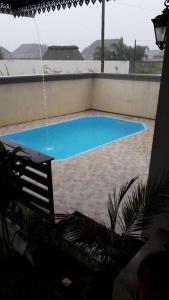 Kolam renang di atau dekat dengan Holiday Home Mauritius