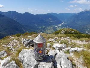 a metal object sitting on top of a mountain at Owl's Nest Bovec in Bovec