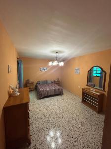 TV a/nebo společenská místnost v ubytování Casa grande en Garachico centro + 42 fotografií