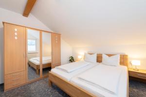 Postel nebo postele na pokoji v ubytování Haus Sahin