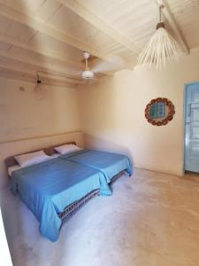 Postel nebo postele na pokoji v ubytování Siwa Oracle Hostel + 20 fotografií