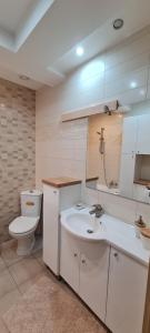 Koupelna v ubytování Apartament w Centrum