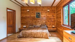 Voodi või voodid majutusasutuse Łabędzi Ostrów Ośrodek Wypoczynkowy toas