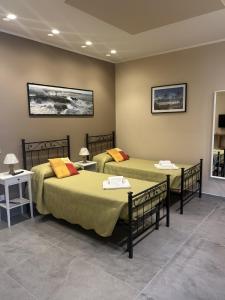 Una cama o camas en una habitación de Villa pace D'oro