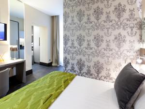 Posteľ alebo postele v izbe v ubytovaní Quirinale Luxury Rooms