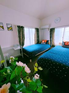 Ένα ή περισσότερα κρεβάτια σε δωμάτιο στο M-house