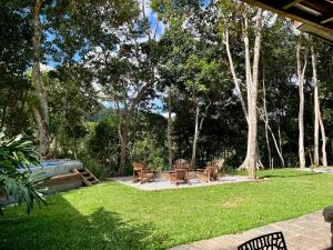 Zahrada ubytování Casa 13 Floresta Boa Vista - Casa Espetacular com 6 Quartos e Arquitetura Única