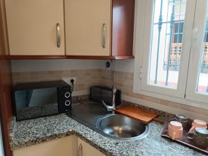 Kuchyň nebo kuchyňský kout v ubytování CASA ALFONSO + 13 fotografií