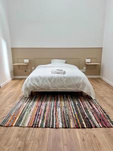 Ένα ή περισσότερα κρεβάτια σε δωμάτιο στο Le loft urbain
