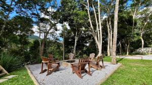 Zahrada ubytování Casa 13 Floresta Boa Vista - Casa Espetacular com 6 Quartos e Arquitetura Única