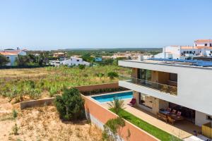 an aerial view of a house with a swimming pool at Victoria Atlantica in Sagres