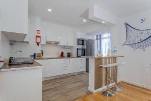 Η κουζίνα ή μικρή κουζίνα στο GuestReady - Ocean paradise in Ponta Delgada