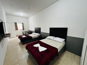 Postel nebo postele na pokoji v ubytování Studio espaçoso e confortável em São Paulo ZN