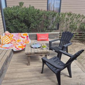 Posezení v ubytování Le Lounge à 200 m de la plage Camping 5 étoiles