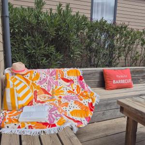 Posezení v ubytování Le Lounge à 200 m de la plage Camping 5 étoiles