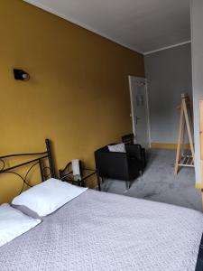 Postel nebo postele na pokoji v ubytování Hôtel de la Plage