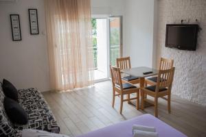 TV/trung tâm giải trí tại Apartments Bevanda