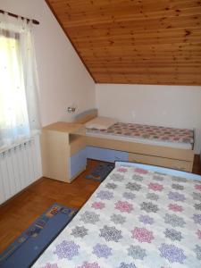 Ein Bett oder Betten in einem Zimmer der Unterkunft Apartment Sela