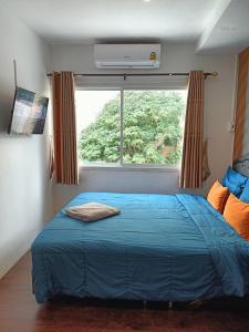 Postel nebo postele na pokoji v ubytování Marie Guest House B4