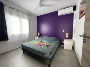 Postel nebo postele na pokoji v ubytování Villas Kanisi 2 et 3 chambres, piscines privatives