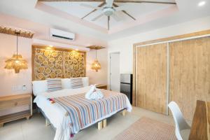 a bedroom with a bed and a sliding glass door at Blue Ridge Retreat in Potrero