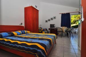 Łóżko lub łóżka w pokoju w obiekcie Apartments Livia