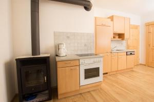 Kuchyň nebo kuchyňský kout v ubytování Grainmeister + 7 fotografií